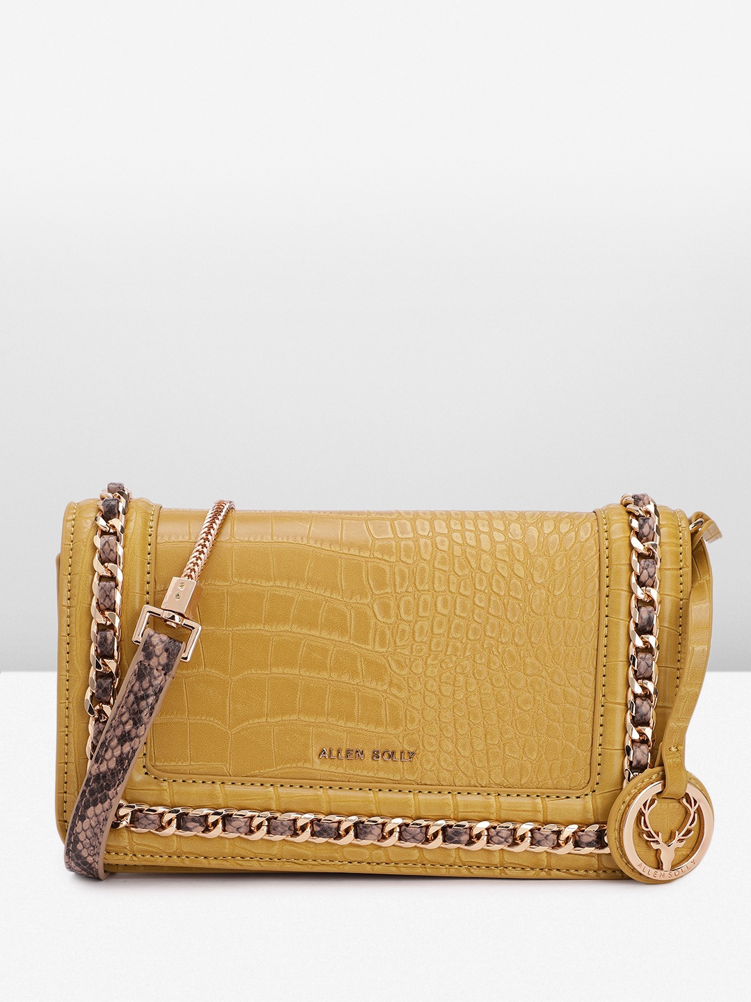 

Allen Solly Crocodile Textured Structured Sling Bag With Link Chain & Tasselled Detail, Mustard