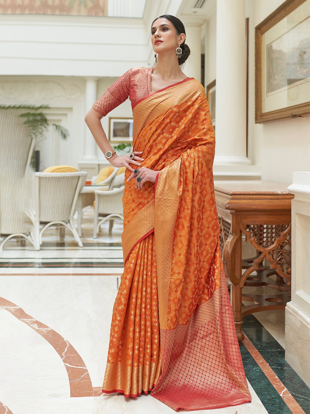 

DEVATITHI Ethnic Motifs Woven Design Zari Patola Saree, Orange