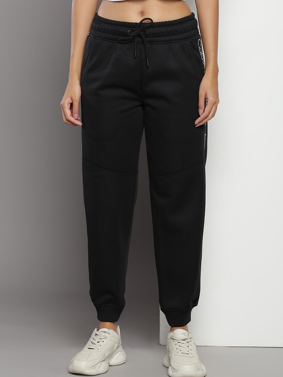 

Calvin Klein Women Brand Logo Printed Relaxed Fit Joggers, Black