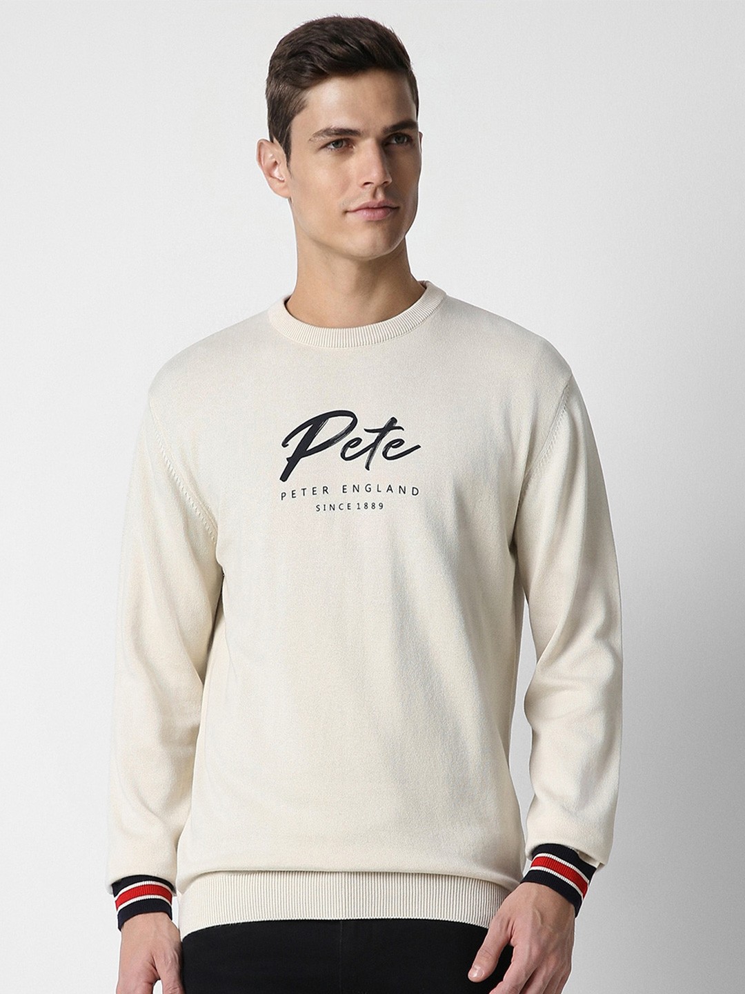 

Peter England Casuals Typography Printed Round Neck Pure Cotton Pullover, Cream