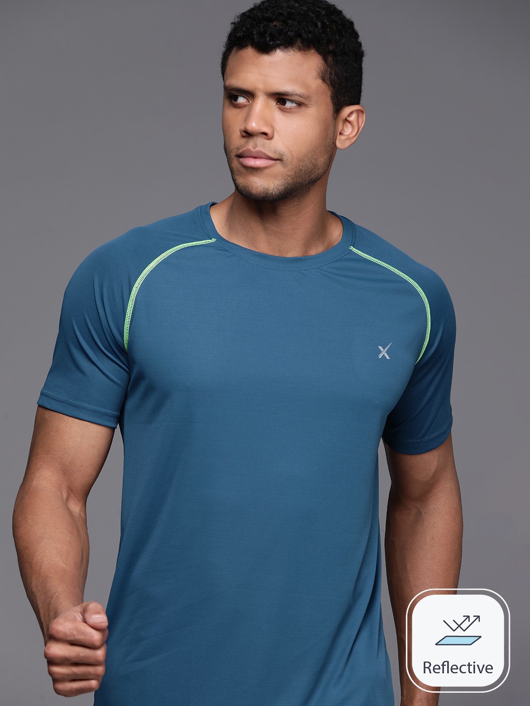 

HRX by Hrithik Roshan Men Solid Sports T-shirt, Blue