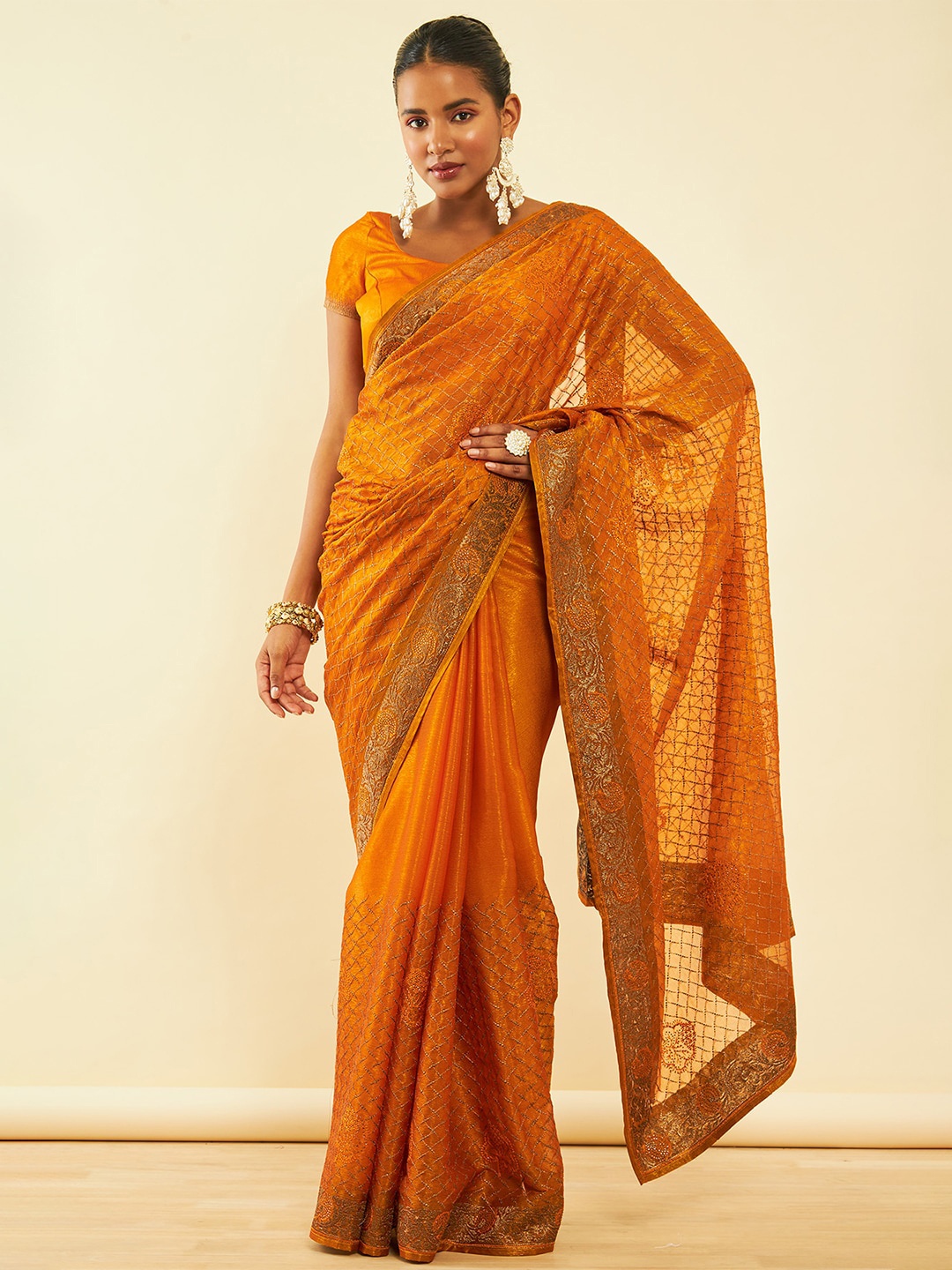 

Soch Mustard Floral Embroidered Zari Pure Chiffon Saree