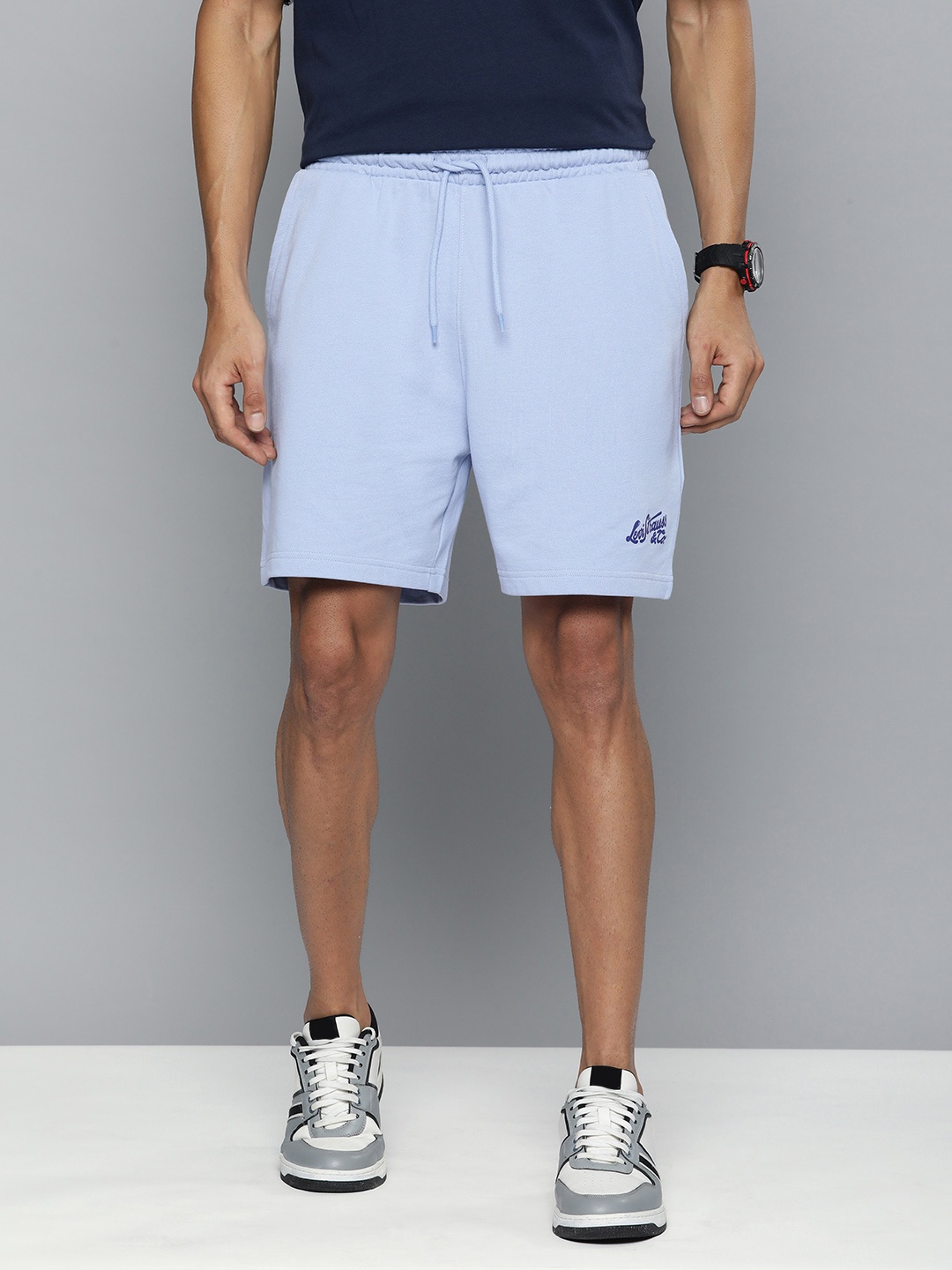 

Levis Men Solid Mid-Rise Regular Shorts, Blue