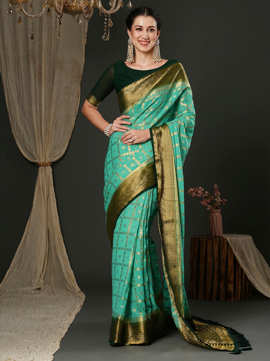 

Anouk Turquoise Blue Ethnic Motifs Woven Design Pure Georgette Kanjeevaram Saree