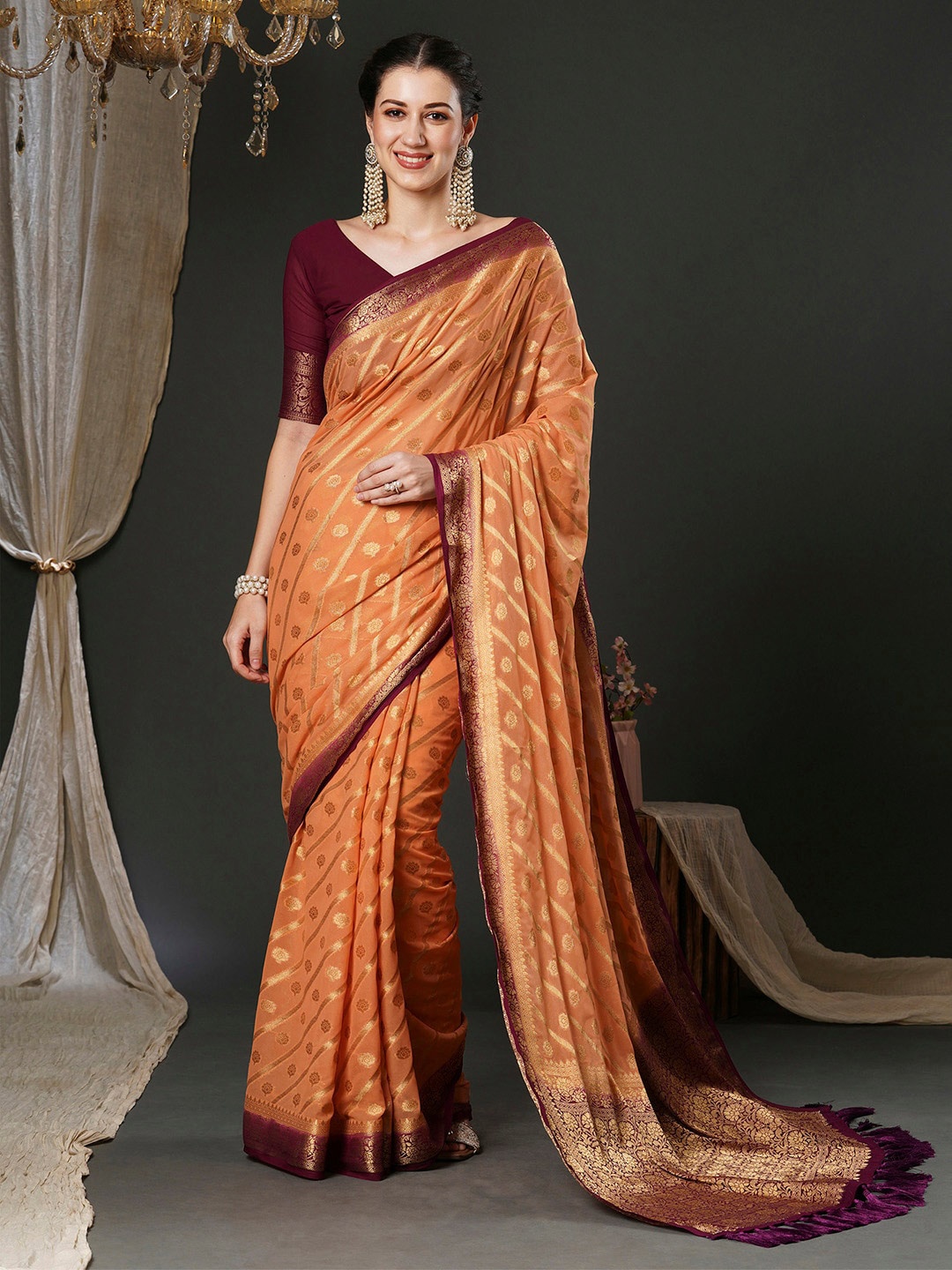 

Anouk Peach-Coloured Ethnic Motifs Woven Design Pure Georgette Kanjeevaram Saree