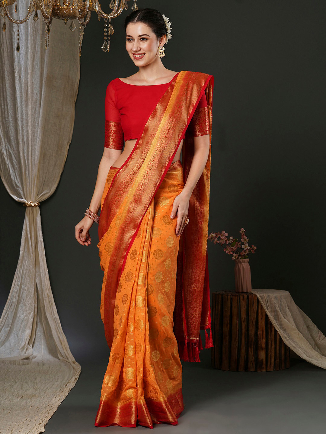 

Anouk Orange Ethnic Motifs Woven Design Pure Georgette Kanjeevaram Saree