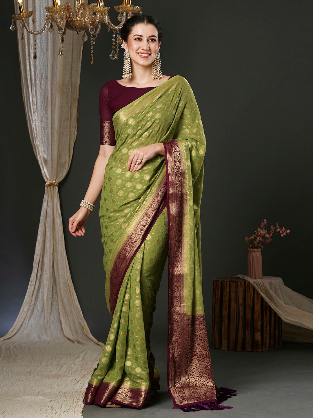 

Anouk Green Ethnic Motifs Woven Design Pure Georgette Kanjeevaram Saree