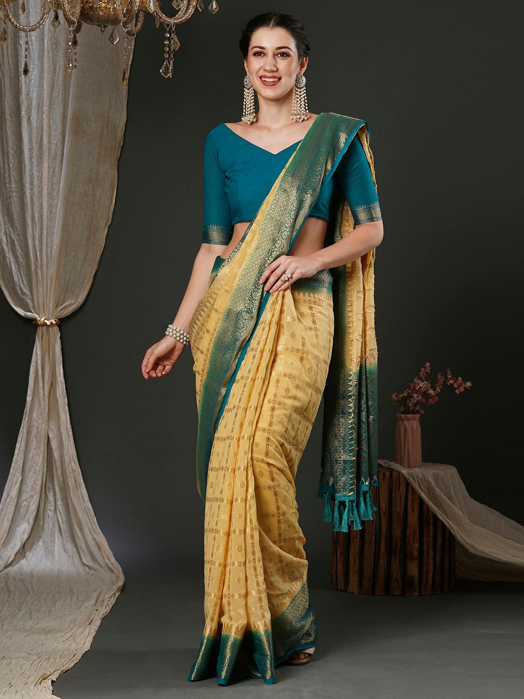 

Anouk Cream-Coloured Ethnic Motifs Woven Design Zari Pure Georgette Saree