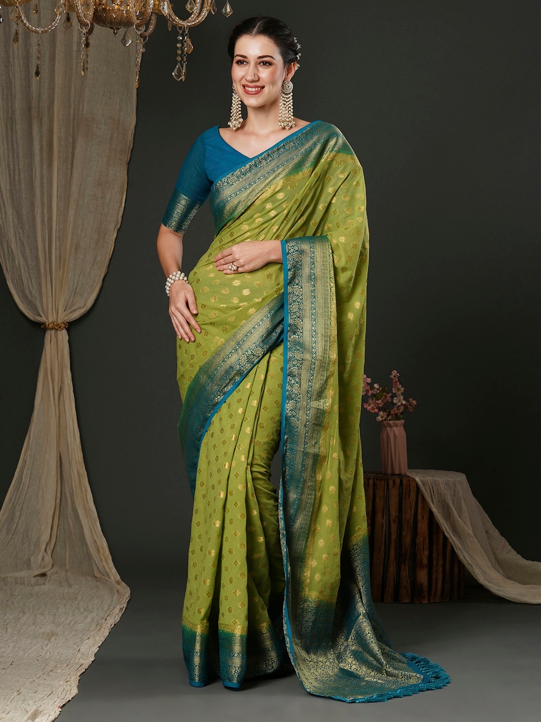 

Anouk Green Ethnic Motifs Woven Design Zari Pure Georgette Kanjeevaram Saree