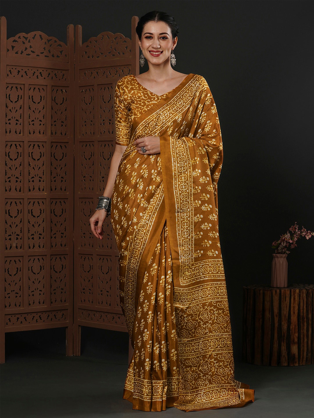 

Anouk Brown Ethnic Motifs Printed Dabu Saree