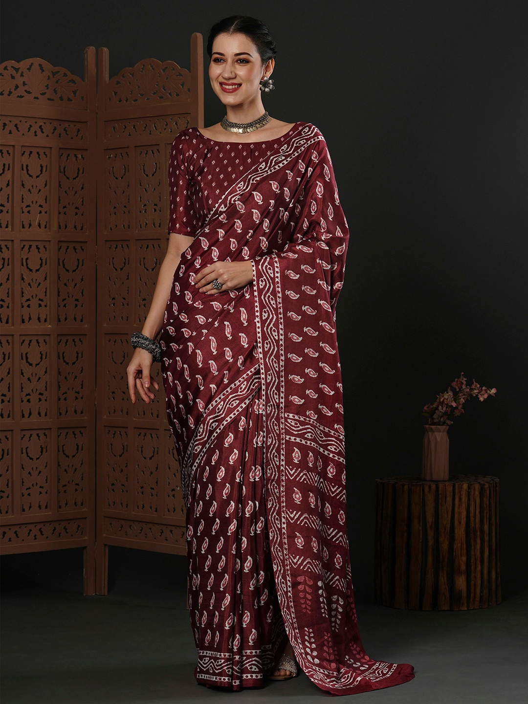 

Anouk Ethnic Motifs Printed Dabu Saree, Maroon