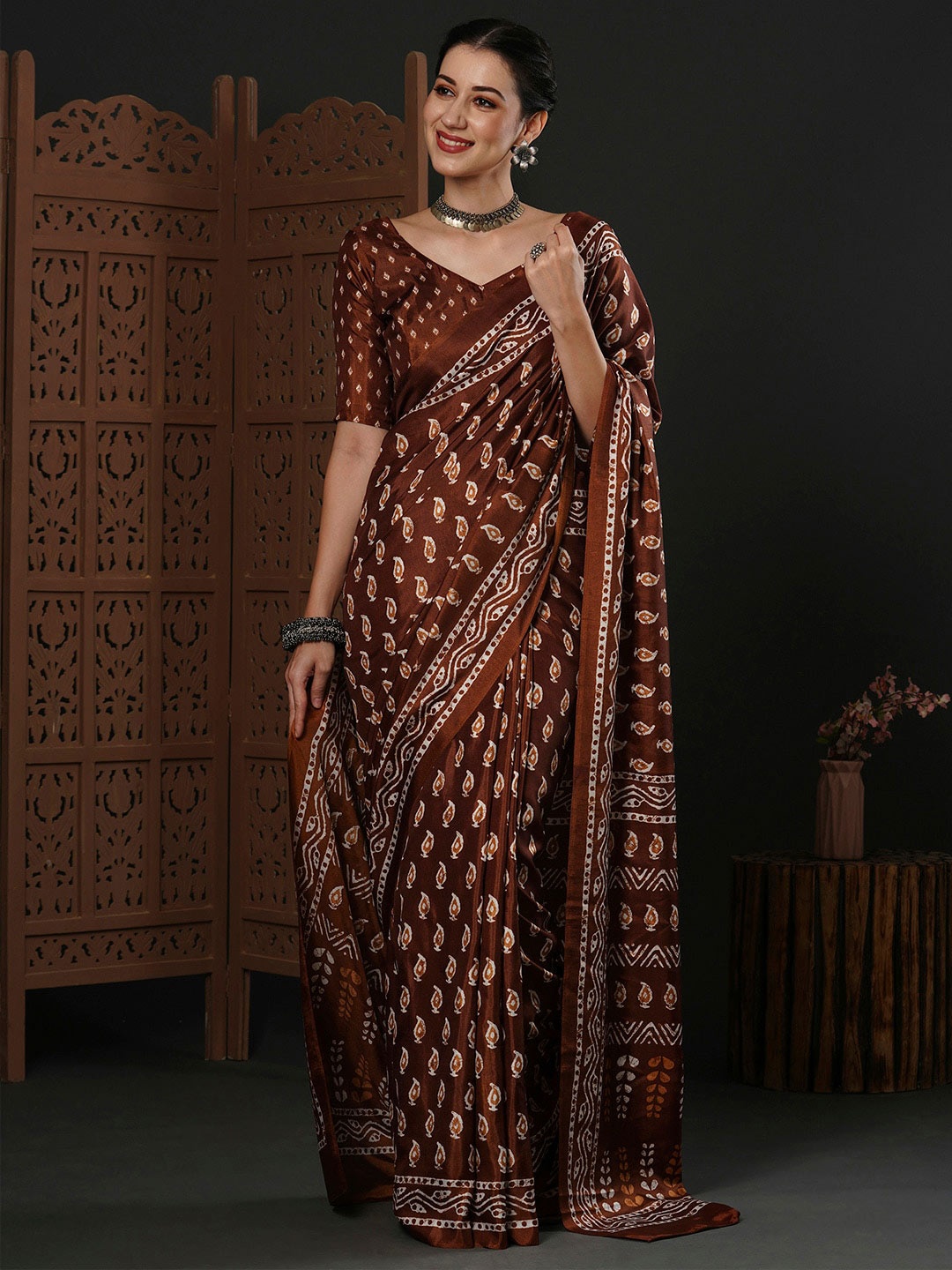 

Anouk Rustic Brown Ethnic Motifs Printed Dola Silk Dabu Saree