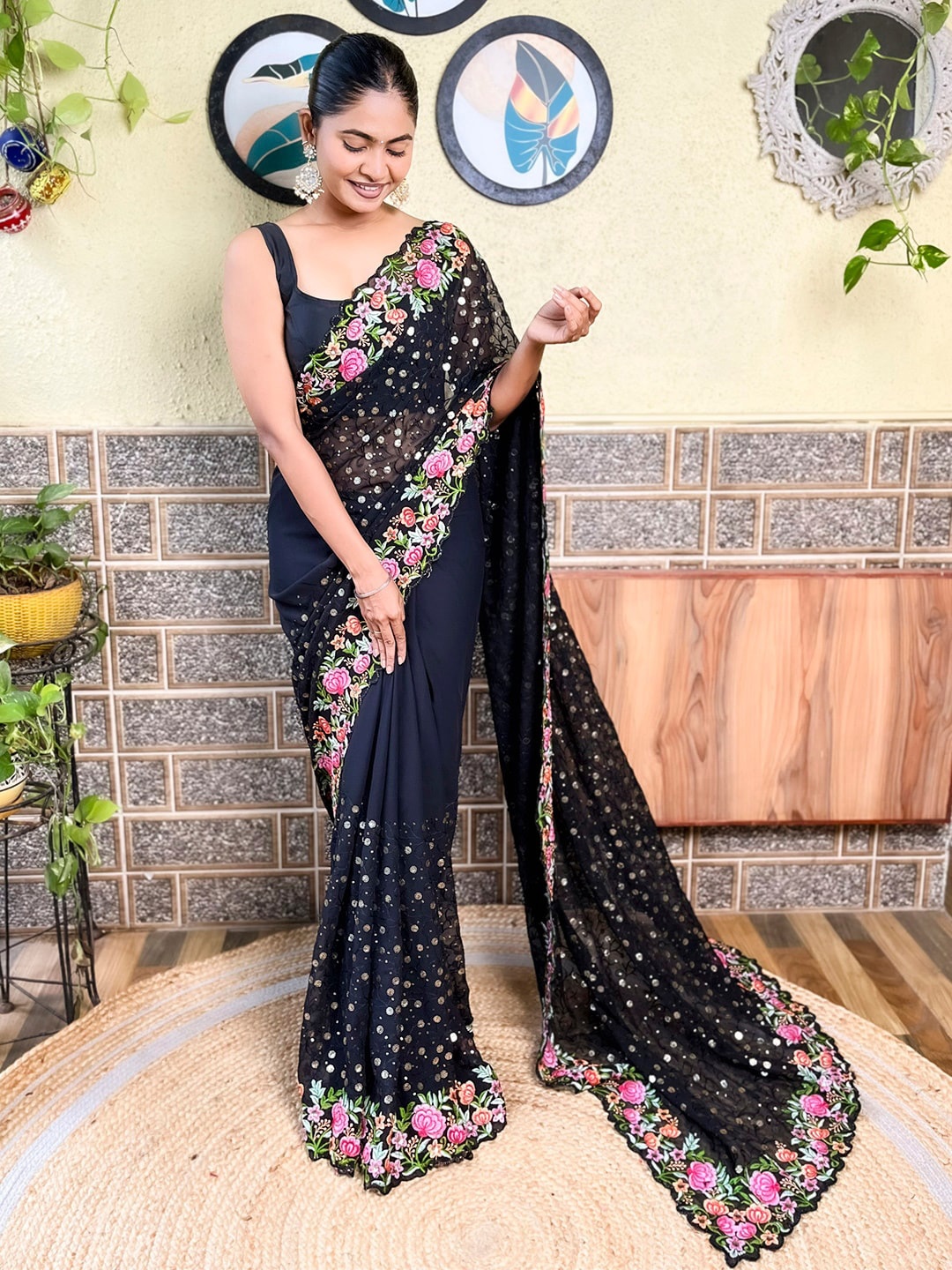 

Mitera Black Ethnic Motifs Embellished Embroidered Poly Georgette Saree