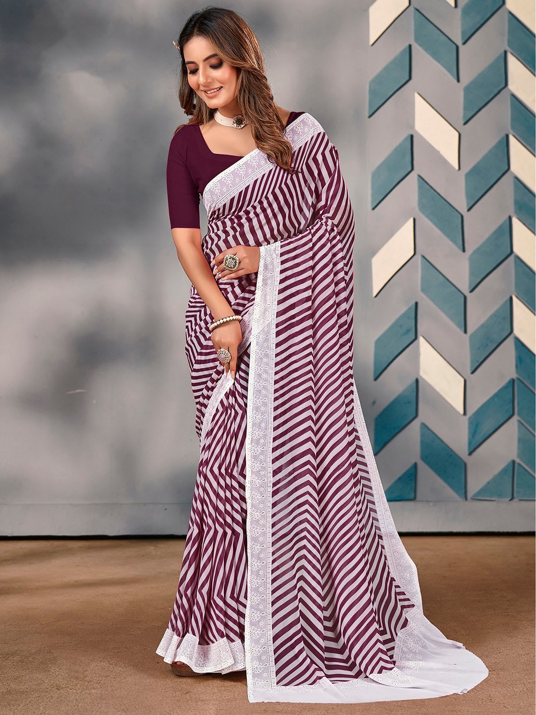 

Saree mall Purple Striped Schiffli Pure Georgette Sarees