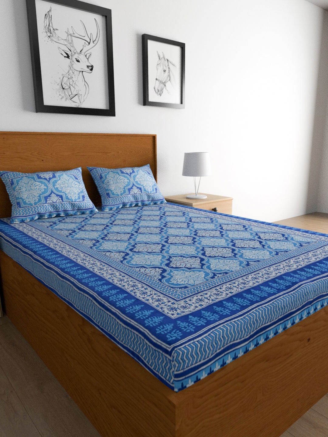 

Urban Magic Blue Printed Cotton 104 TC King Bedsheet with 2 Pillow Covers