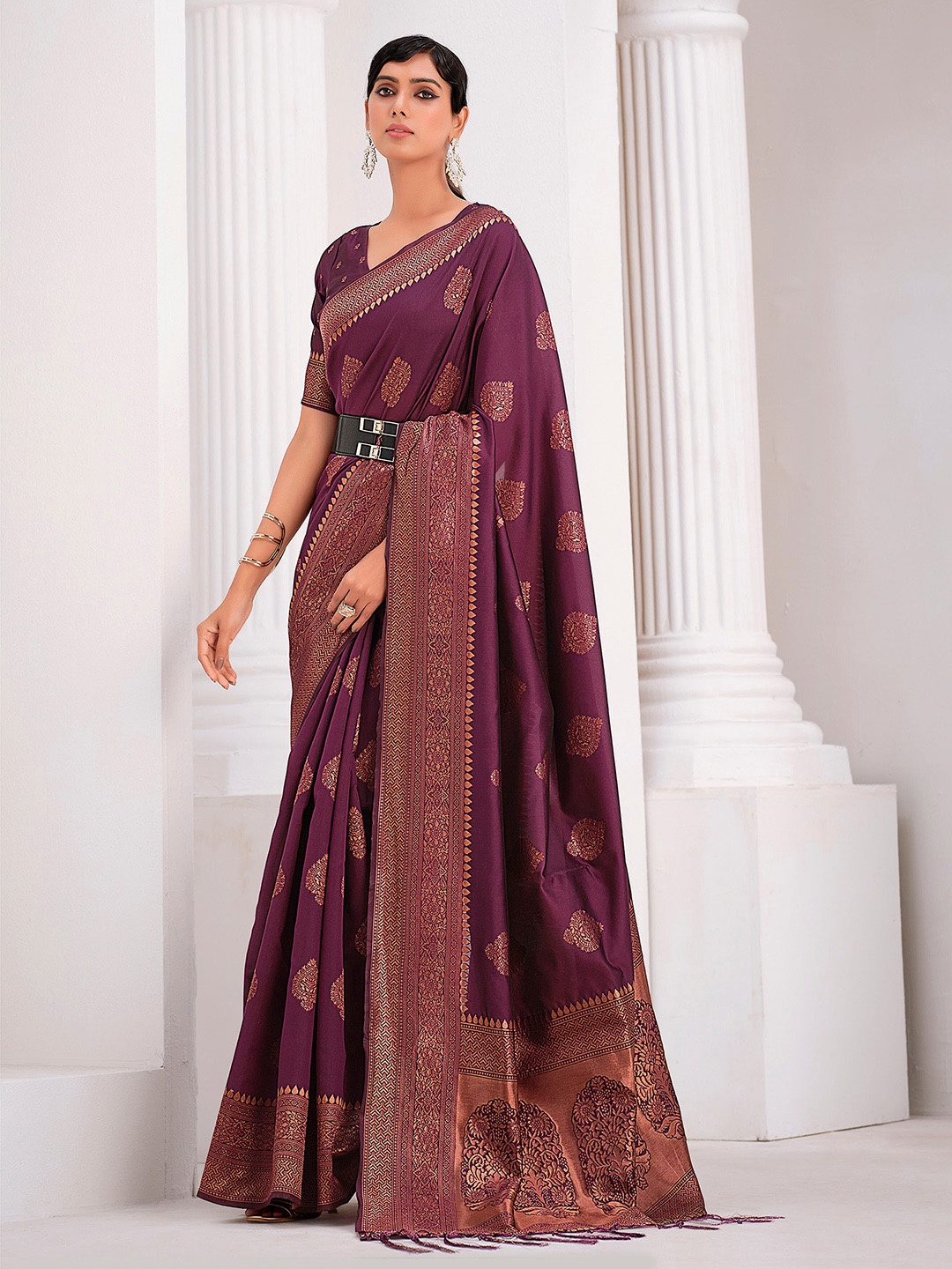 

Sangria Purple Ethnic Motifs Woven Design Zari Detailed Saree