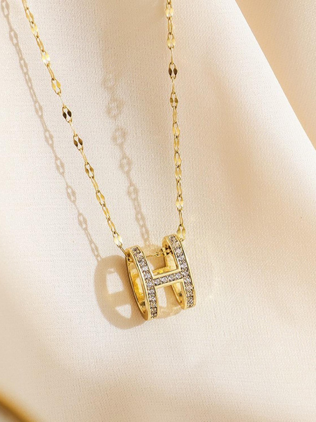 

MYKI Gold-Plated CZ-Studded Pendant With Chain