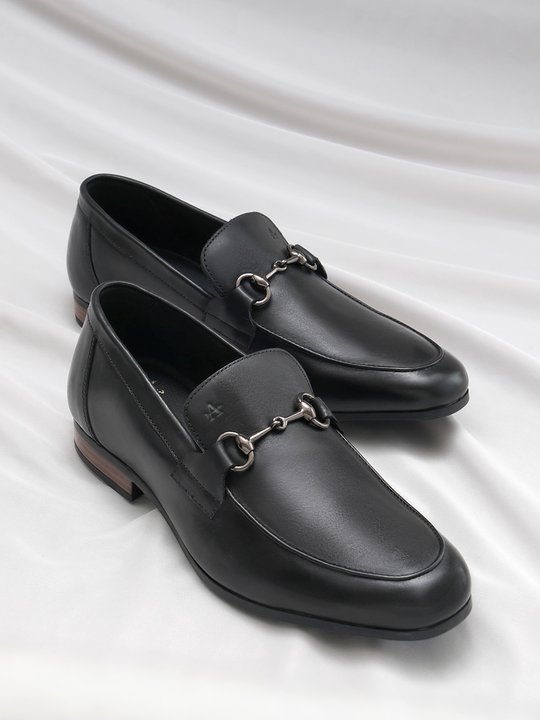 

Arrow Men Solid VITUS Formal Leather Horsebit Loafers, Black
