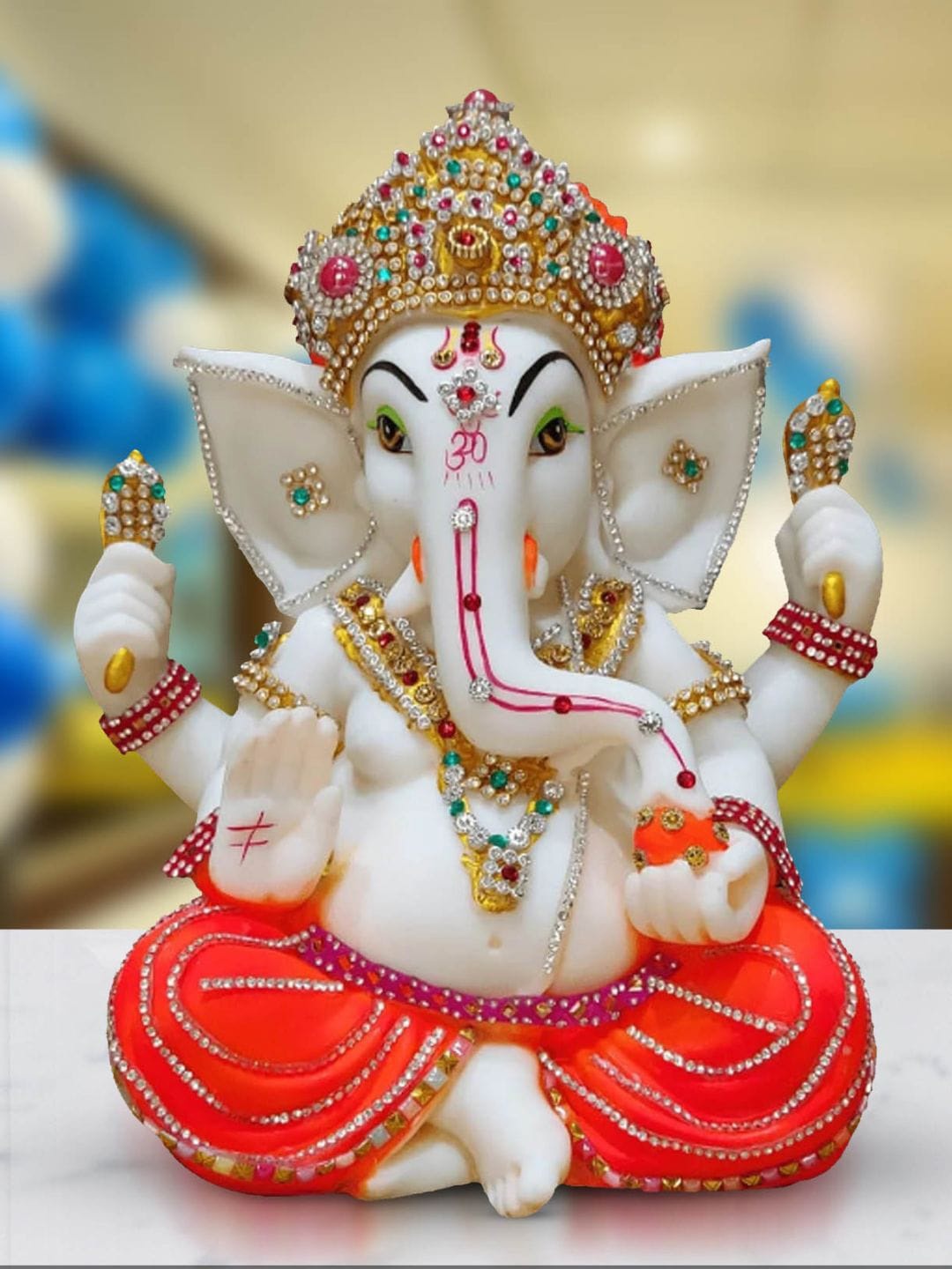 

Mariner's Creation Orange Medium Ganesha Idol Showpiece