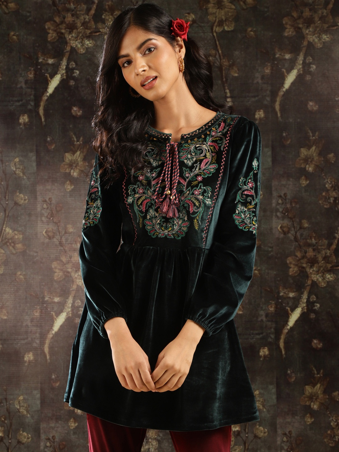 

Lakshita Embroidered Thread Work Yoke Velvet Kurti With Tassels, Green