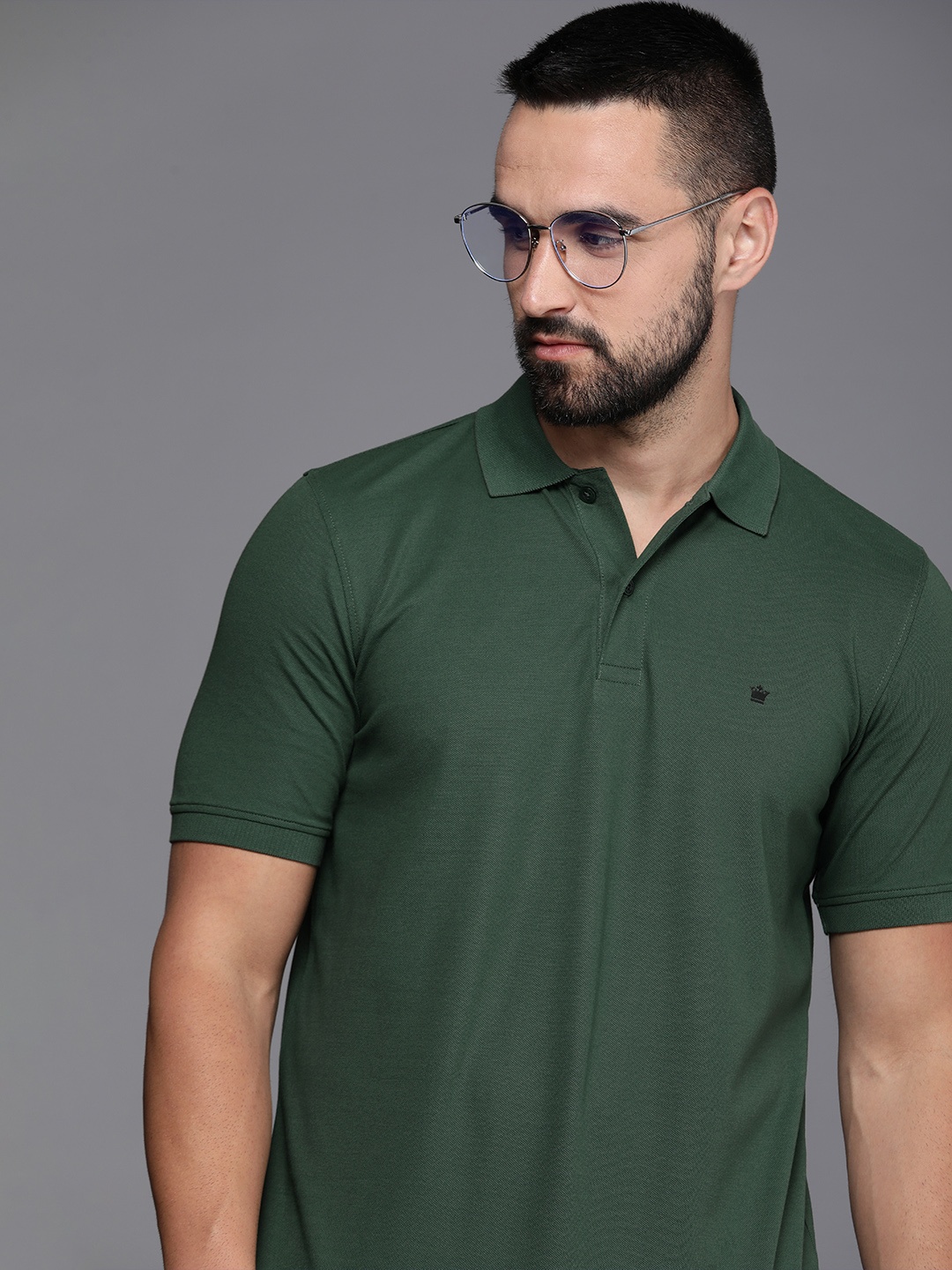 

Louis Philippe Solid Polo Collar Casual T-shirt, Green