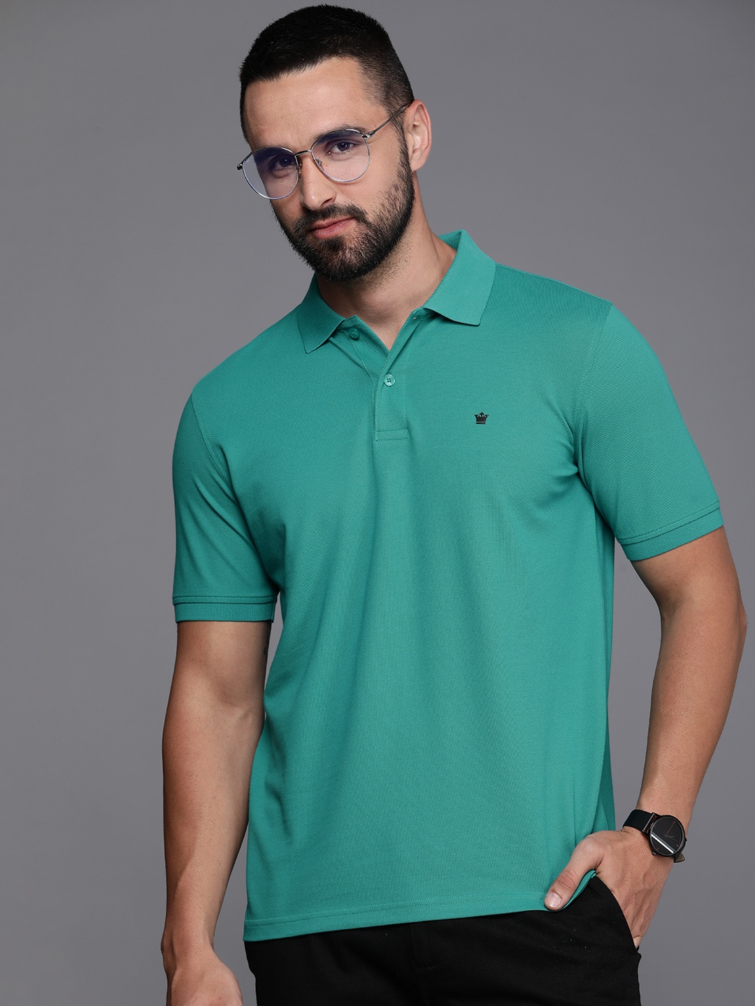 

Louis Philippe Solid Polo Collar Casual T-shirt, Green