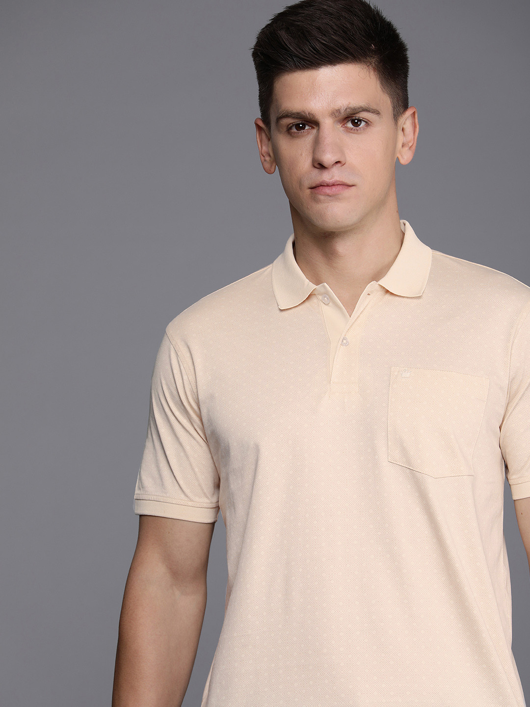 

Louis Philippe Printed Polo Collar Pure Cotton Pockets T-shirt, Cream
