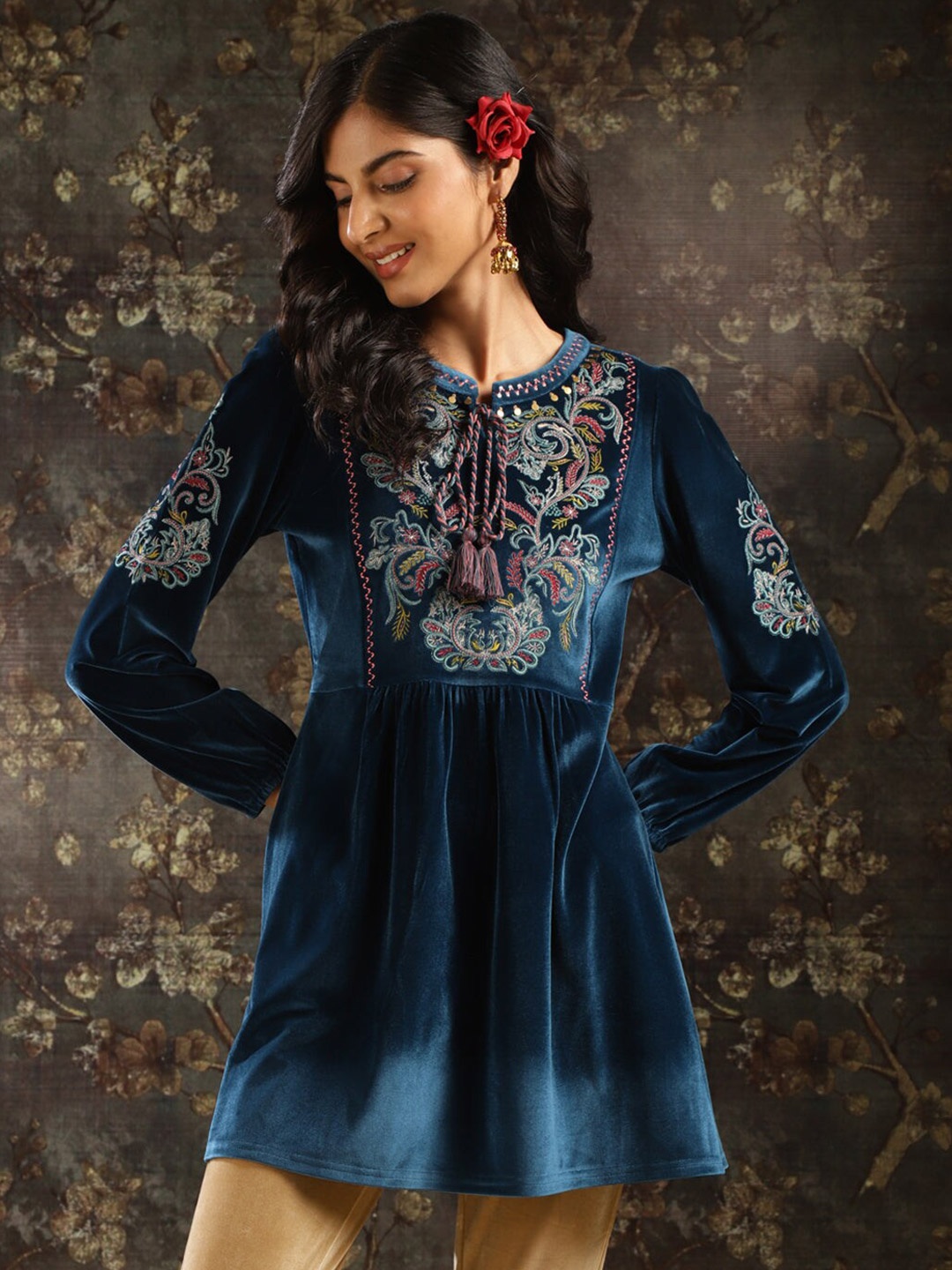 

Lakshita Teal & rich black Ethnic Motifs Embroidered A-Line & Pleated Velvet Kurti