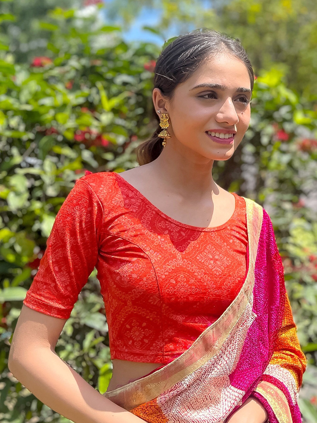 

Bindigasm's Advi Embellished Jacquard Stretchable Saree Blouse, Orange