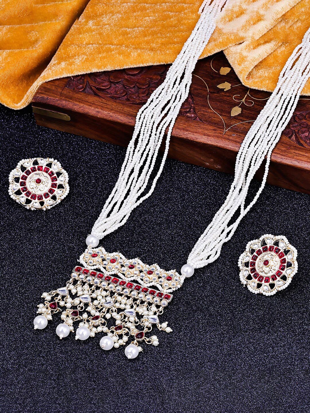 

Sukkhi Gold-Plated American Diamond Stones Studded & Beaded Jewellery Set