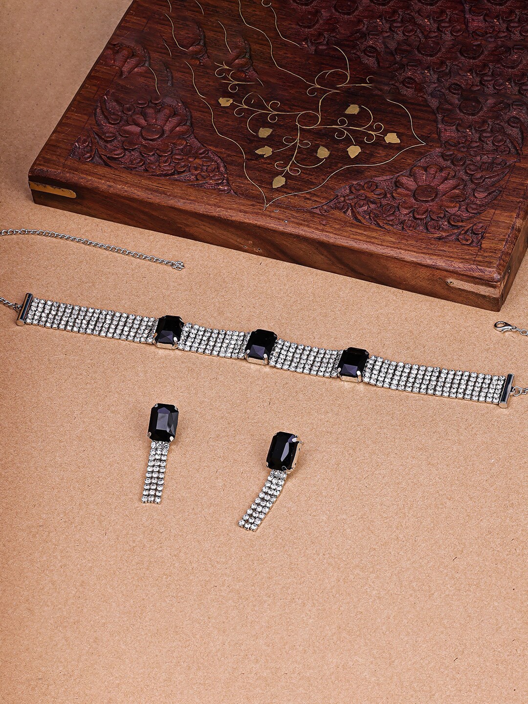 

Sukkhi Gold Plated American Diamond Stone Stubbed Jewellery Set