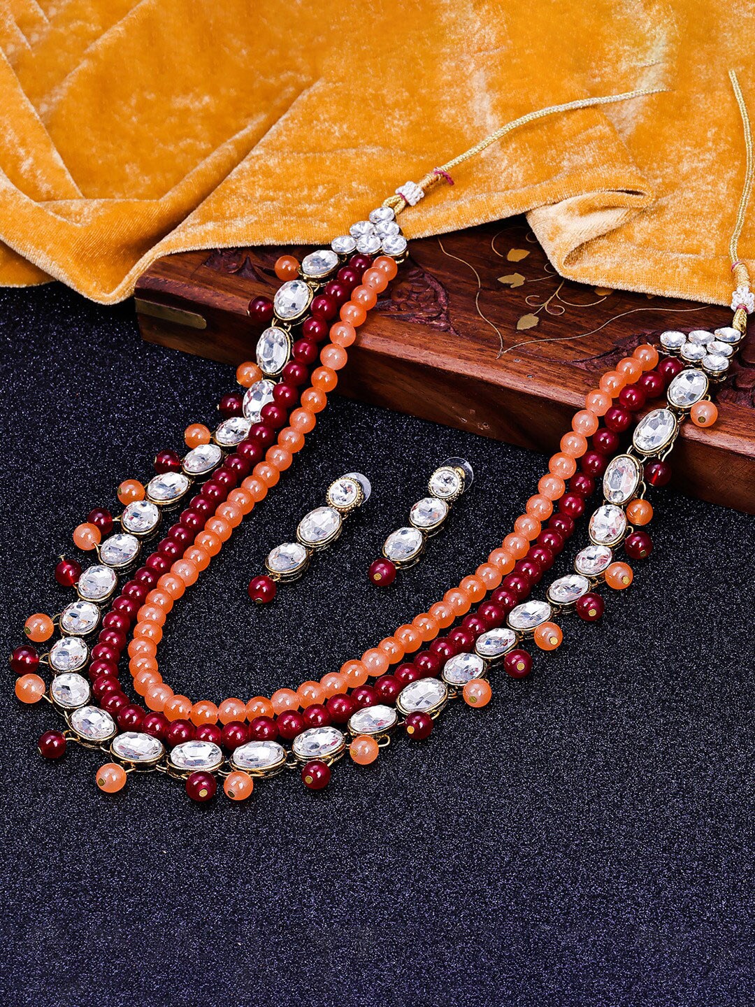 

Sukkhi Gold-Plated American Diamond Stone-Studded & Beaded Jewellery Set, Maroon