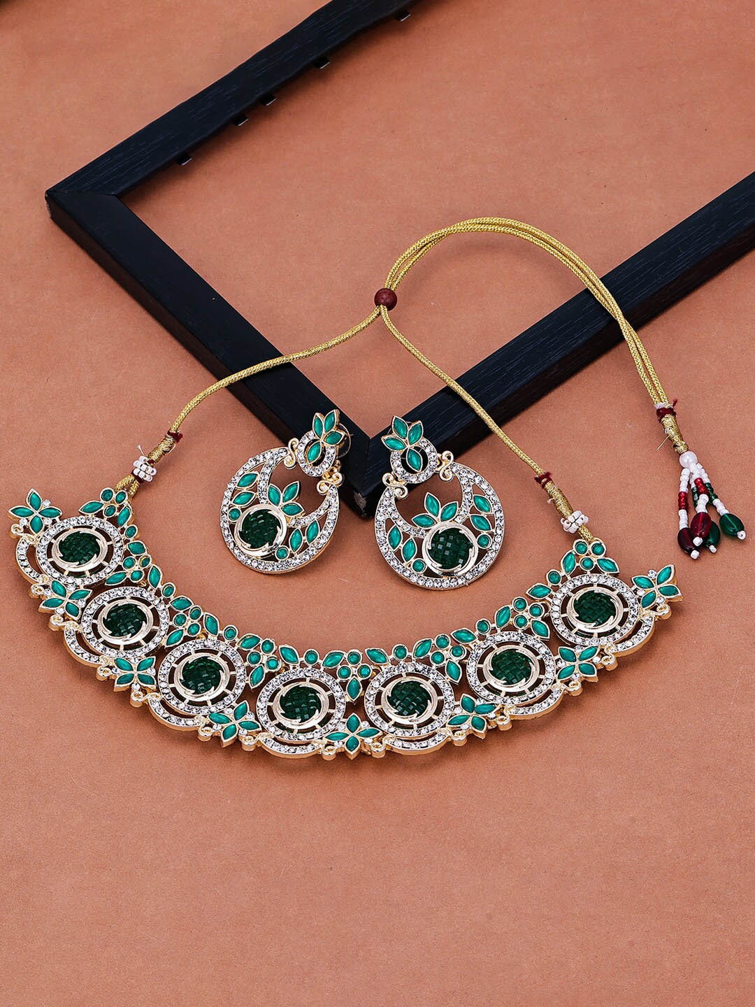 

Sukkhi Gold-Plated American Diamond Studded Jewellery Set