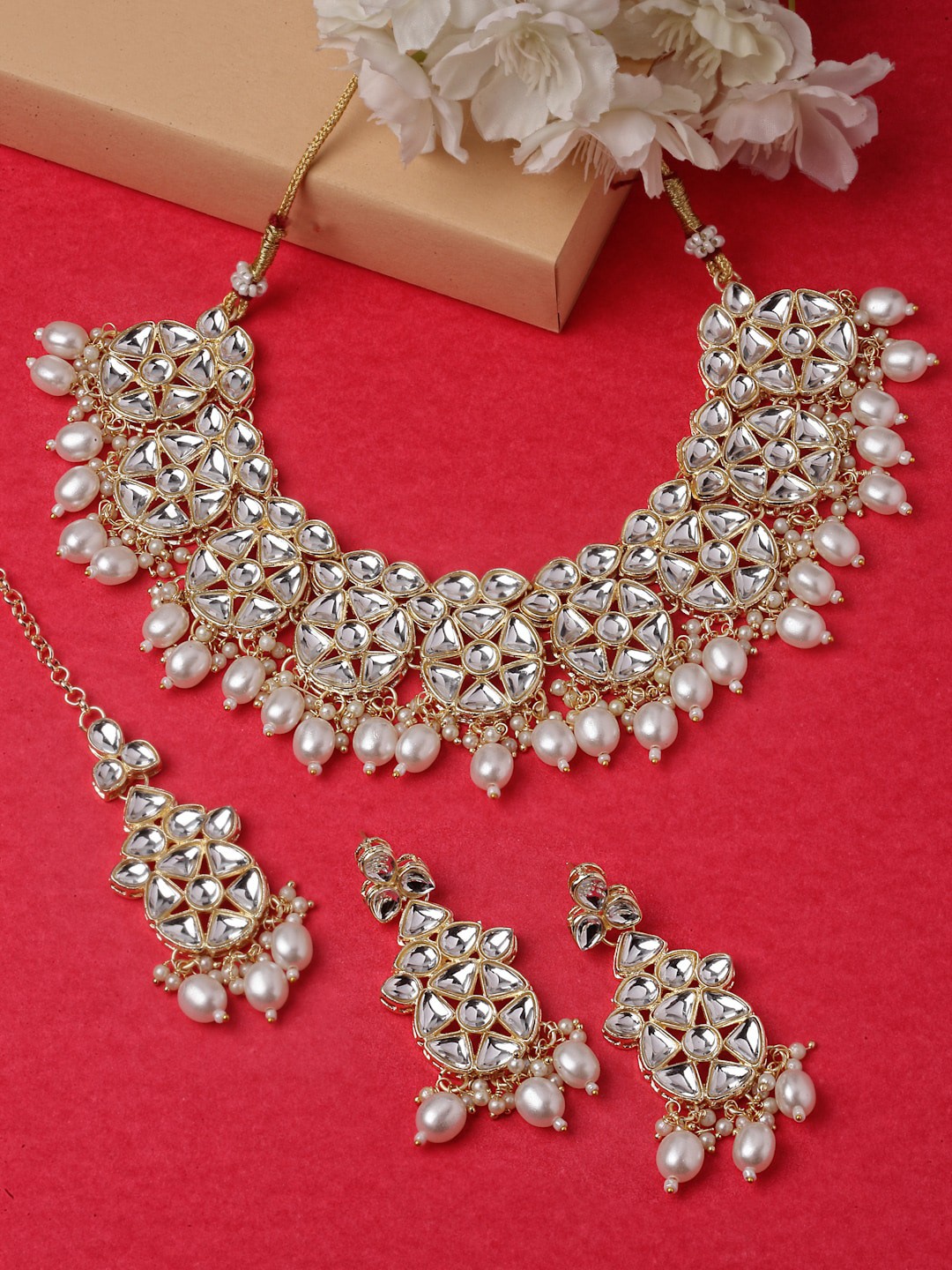 

Sukkhi Gold Plated AD Studded & Pearl Beaded Jewellery Set