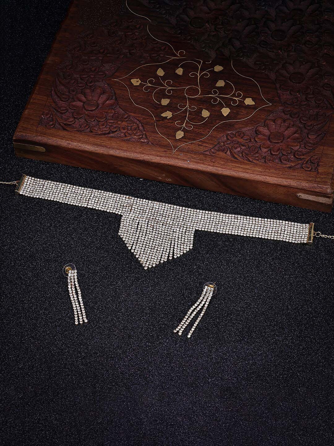 

Sukkhi Gold Plated American Diamond Stone Stubbed Jewellery Set