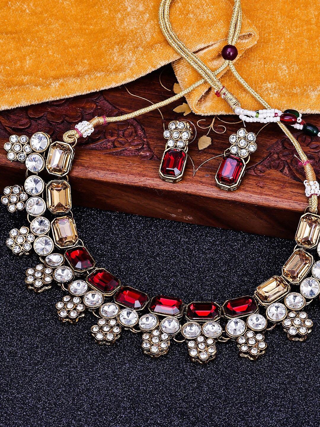 

Sukkhi Gold-Plated AD Stone Studded Jewellery Set