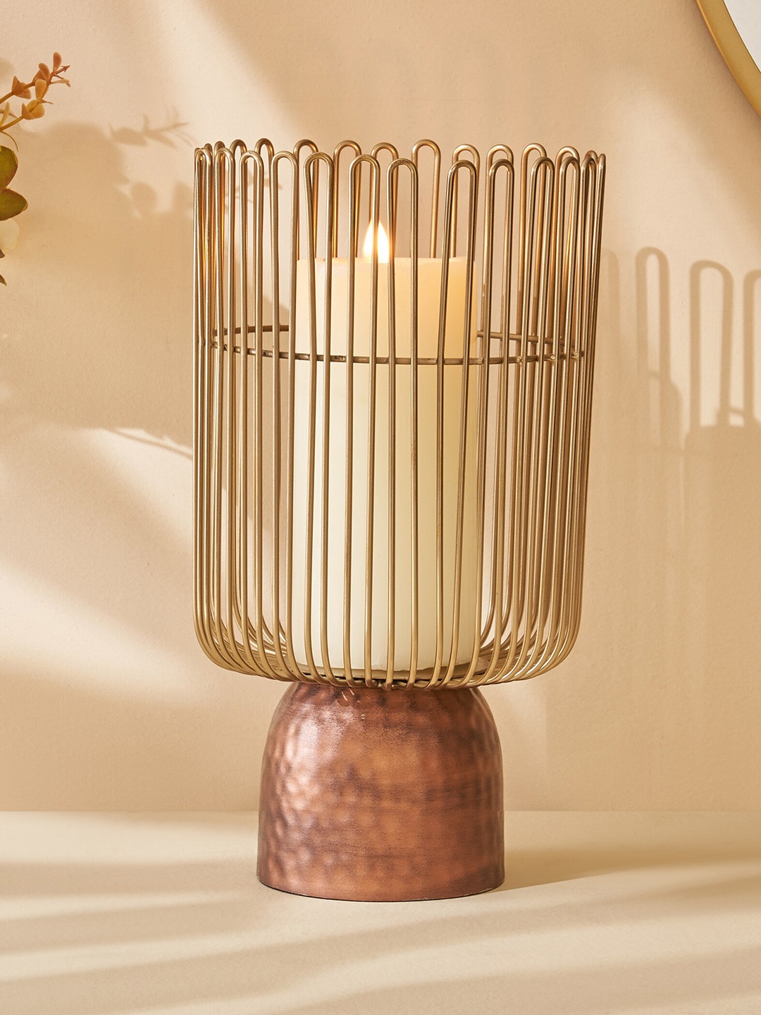 

Home Centre Mystique Filo Brown & Gold Toned Textured Hurricane Candle Holder