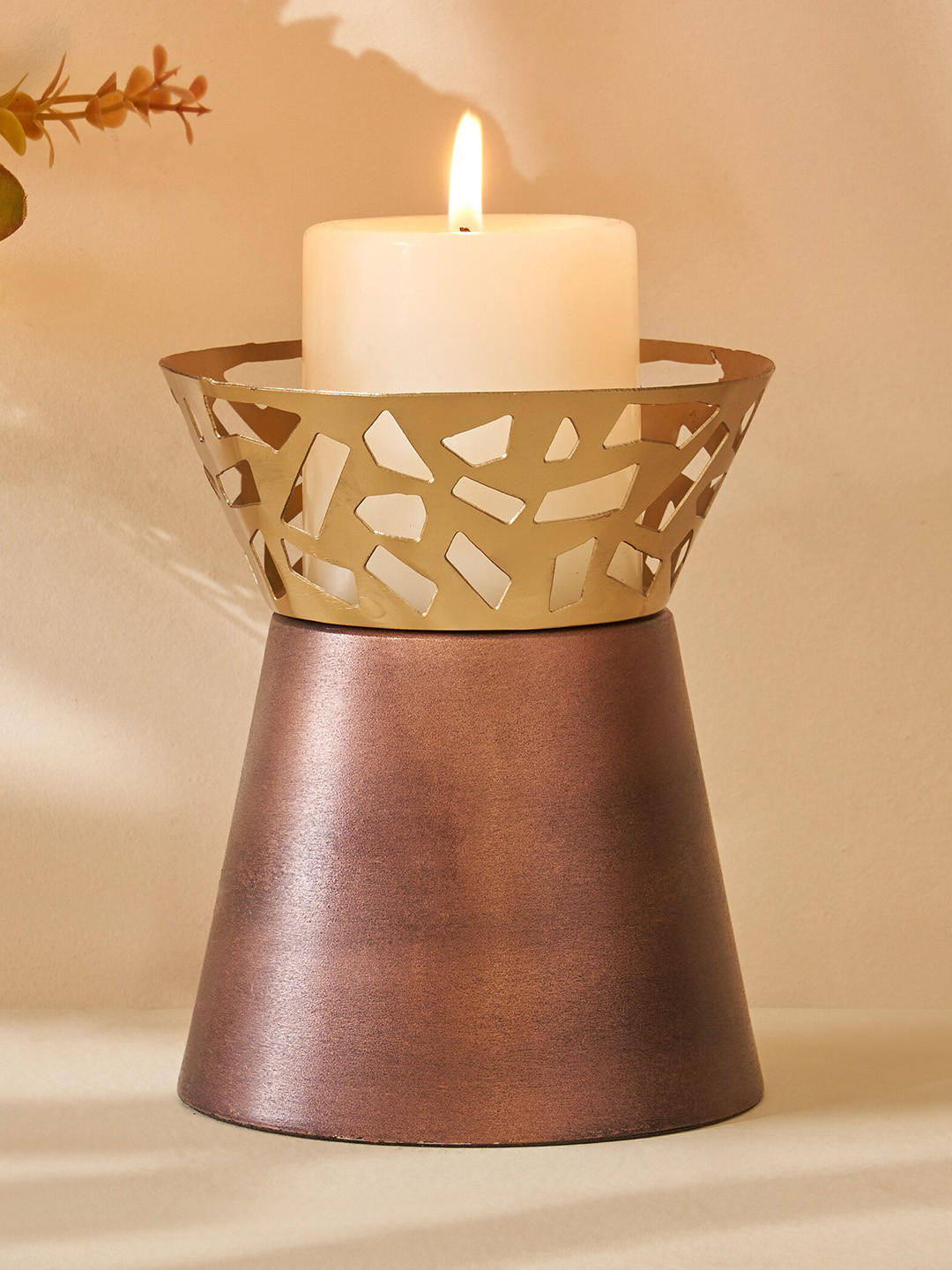 

Home Centre Mystique Forato Gold Toned & Brown Textured Hurricane Candle Holder