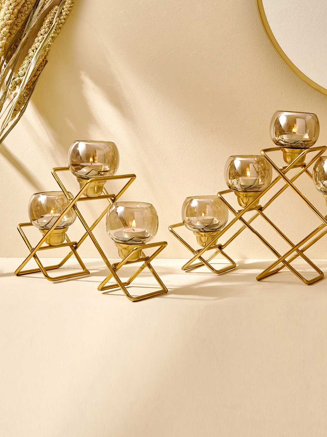 

Home Centre Selena Accord Gold Toned Zig Zag Glass T-Light Candle Holder