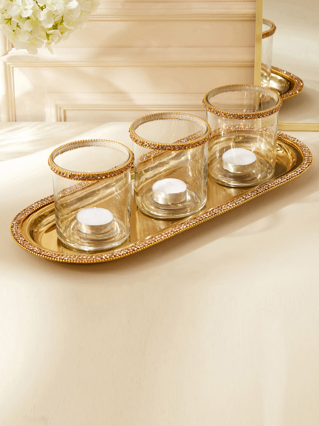 

Home Centre Fables Blane 3 Pieces Transparent Textured T-Light Candle Holder With Tray, Gold