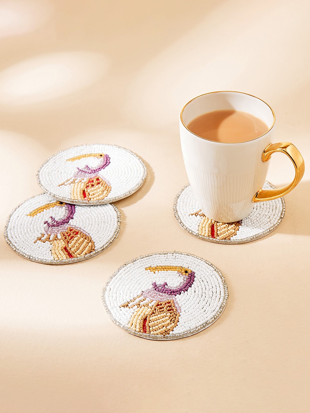 

Home Centre Ebony White & Brown 4 Pieces Beaded Coasters