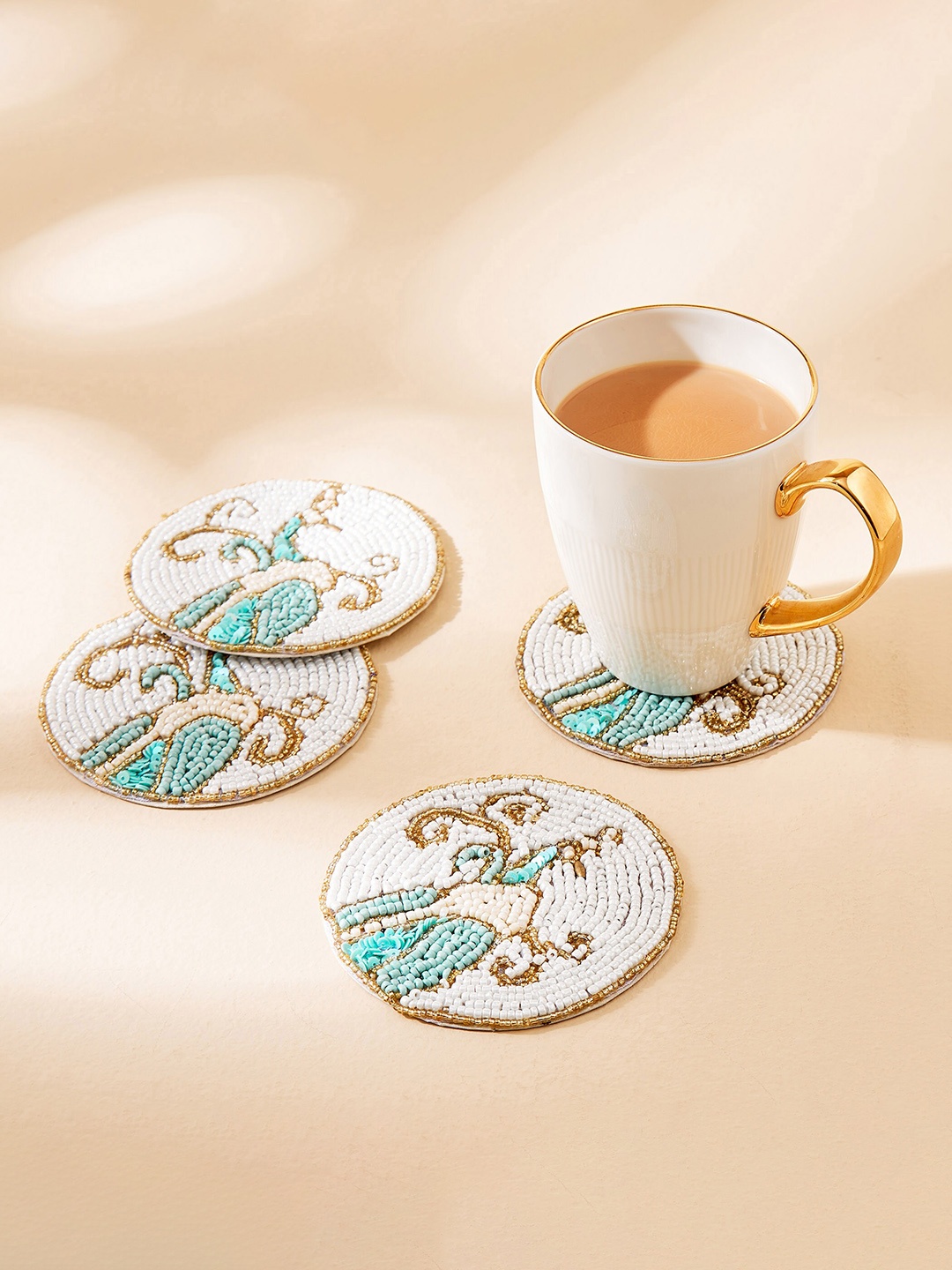 

Home Centre Ebony White & Blue 4 Pieces Beaded Coasters