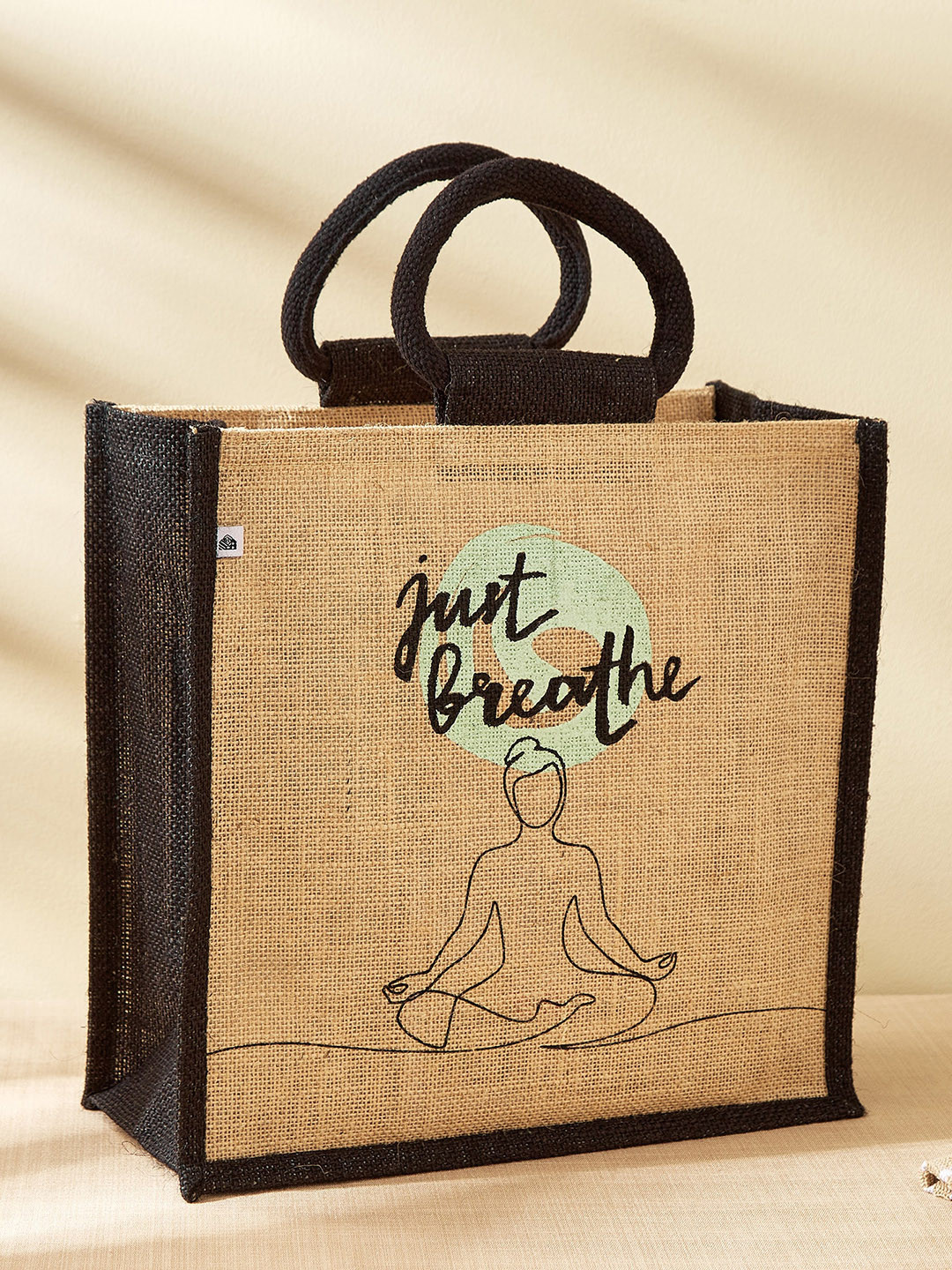 

Home Centre Livia Brown & Black Printed Jute Lunch Bag
