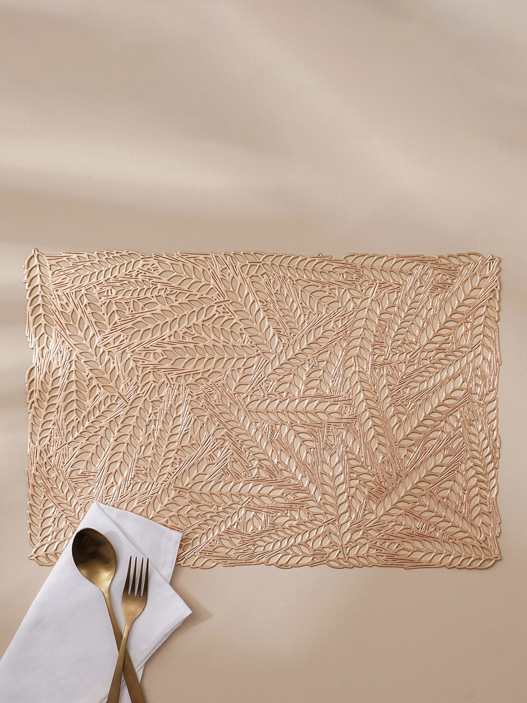 

Home Centre Cinder Copper Toned Floral Rectangle PVC Cutwork Table Placemat