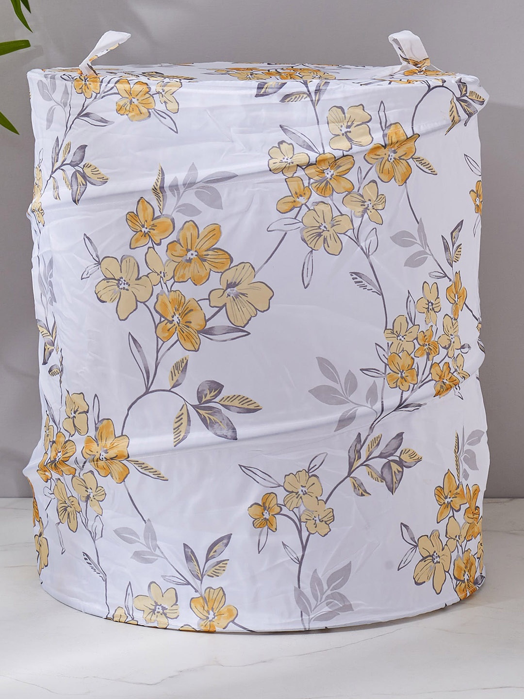 

Home Centre White Floral Printed Foldable Laundry Bag