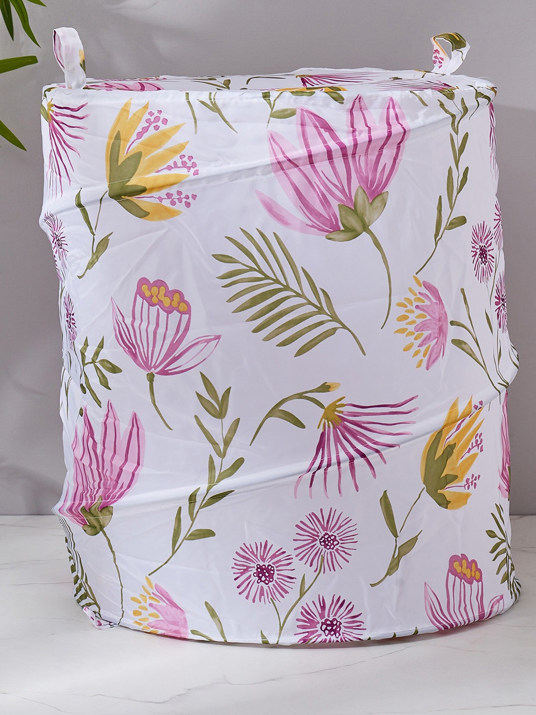 

Home Centre White Floral Printed Foldable Laundry Bag