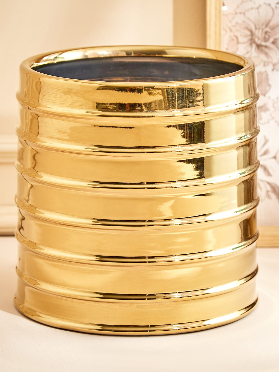 

Home Centre Gold tonned Planter