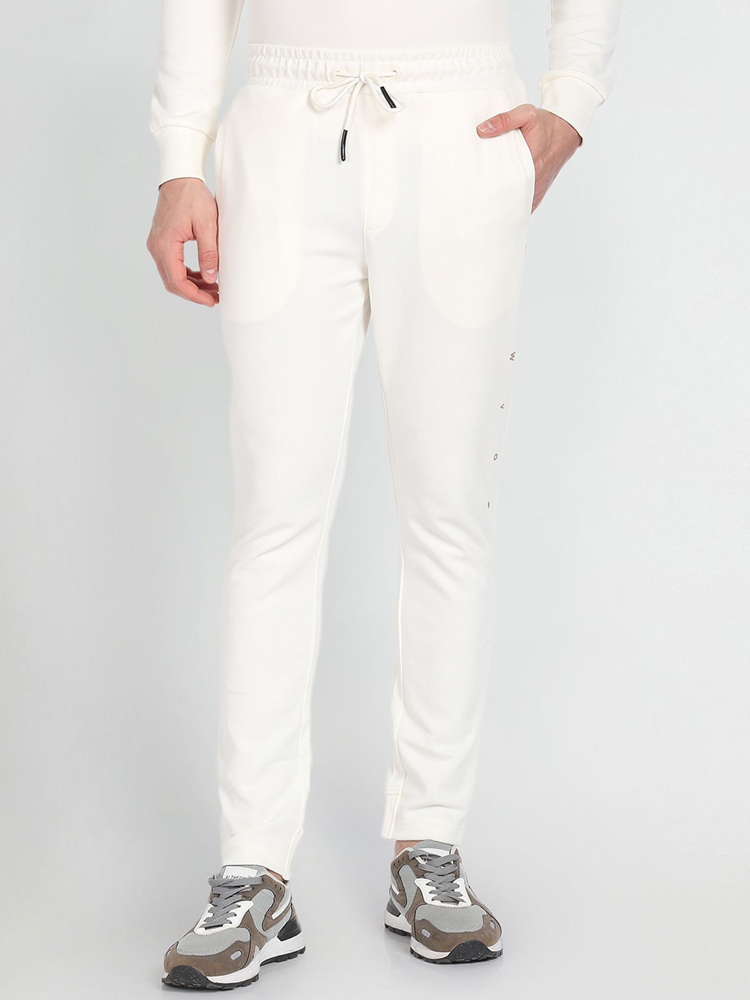 

Arrow New York Men Mid Rise Cotton Joggers, Cream