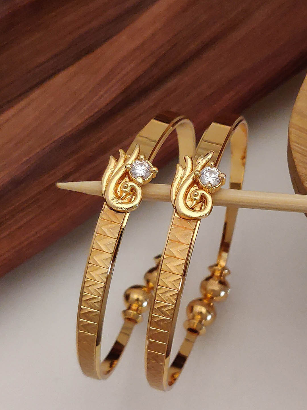 

Shining Diva Set Of 2 Gold Plated & Crystal Studded Bangles