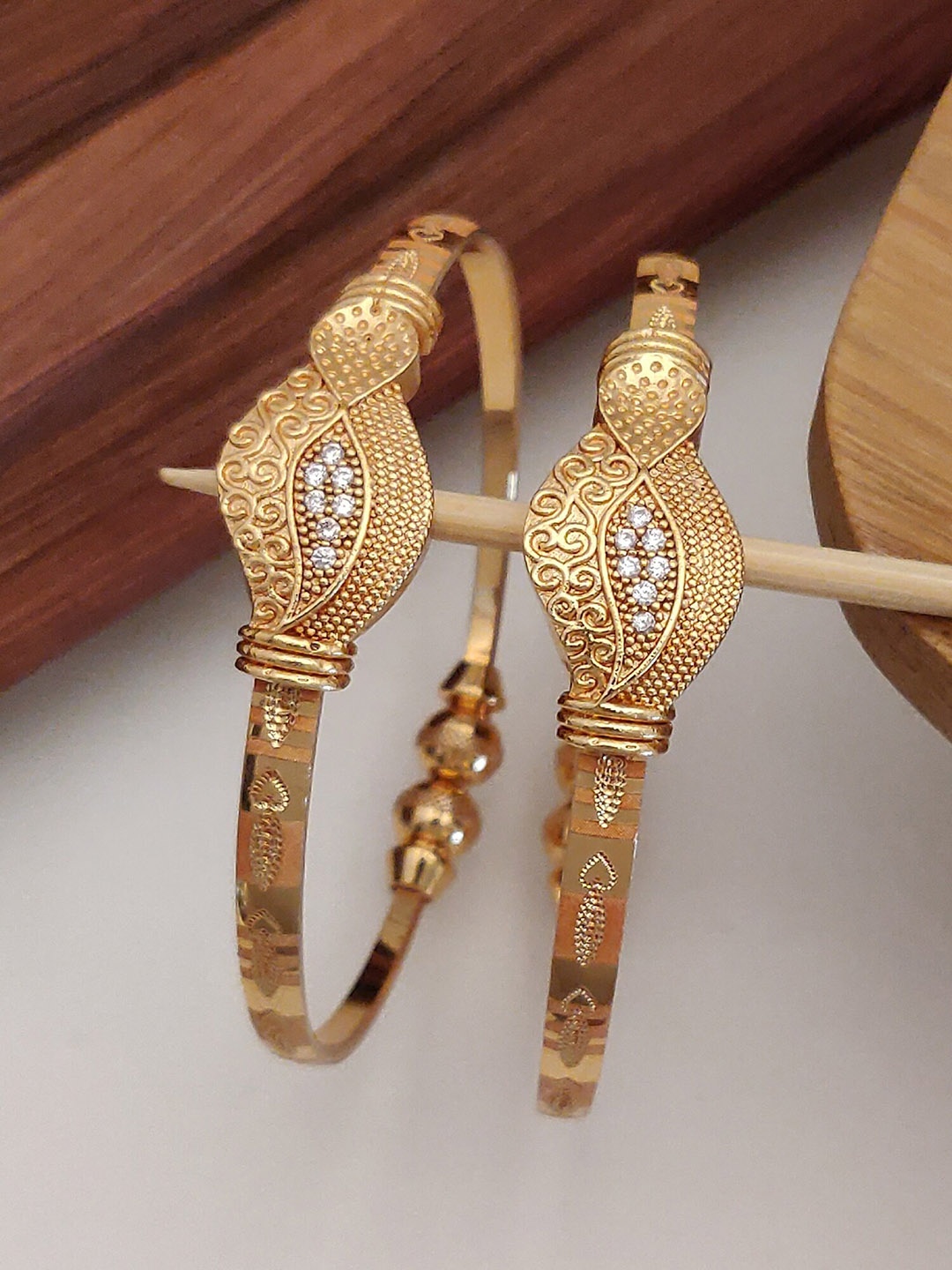 

Shining Diva Set Of 2 Gold Plated Crystal Studded Bangles